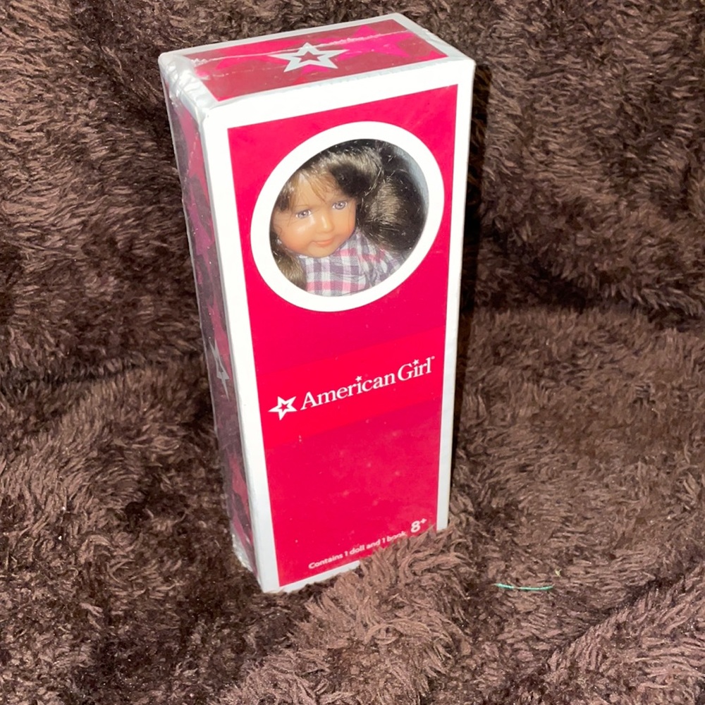 American girl 8+ and 1 book